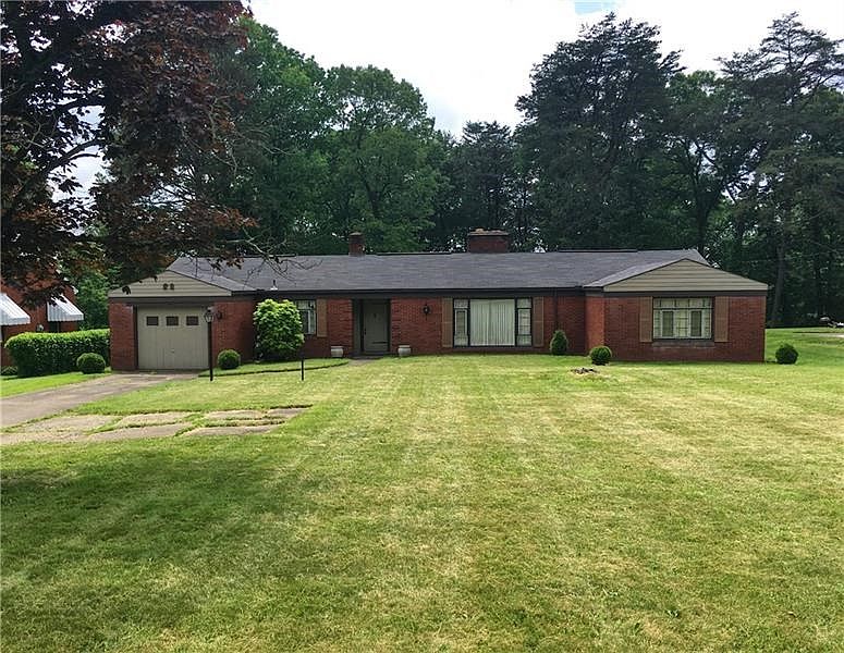Easy one level family living in this spacious 3 bedroom brick ranch located on a expansive lot in Hopewell Twp.