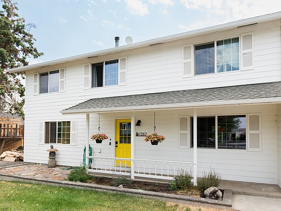 The main house has all four bedrooms upstairs, living, kitchen, laundry, storage and game room downstairs.