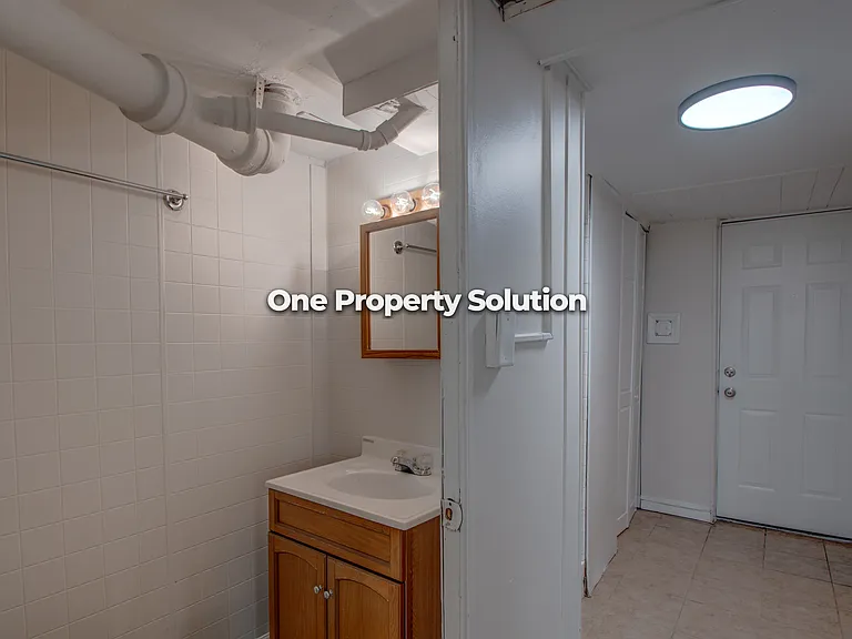 1220 W 41st Ave #BASEMENT — Photo 8