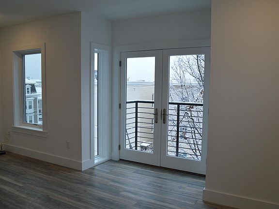 Master bedroom with door to additional private balcony.