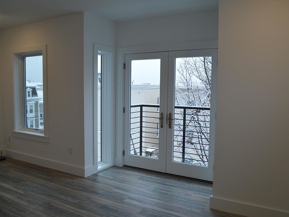 Master bedroom with door to additional private balcony.