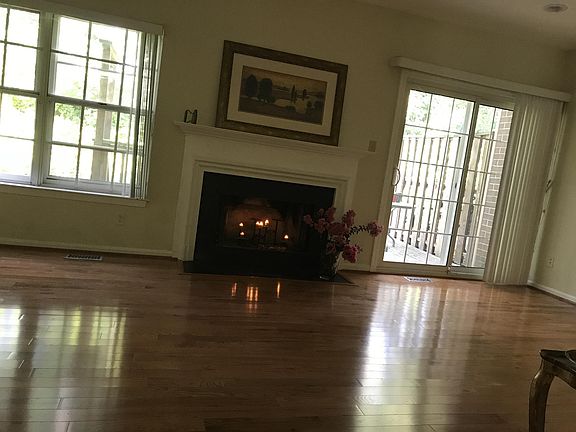 Living Room with Fireplace and sliding door access to deck