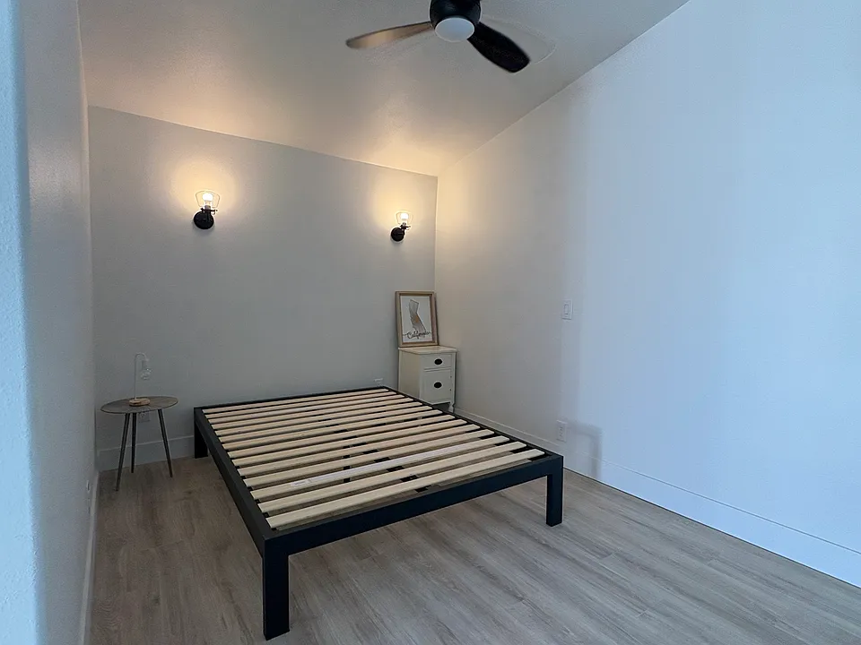A queen sized bed, lighting, ceiling fan and USB ready outlets with room to spare. A NEW queen mattress will be provided prior to move-in.