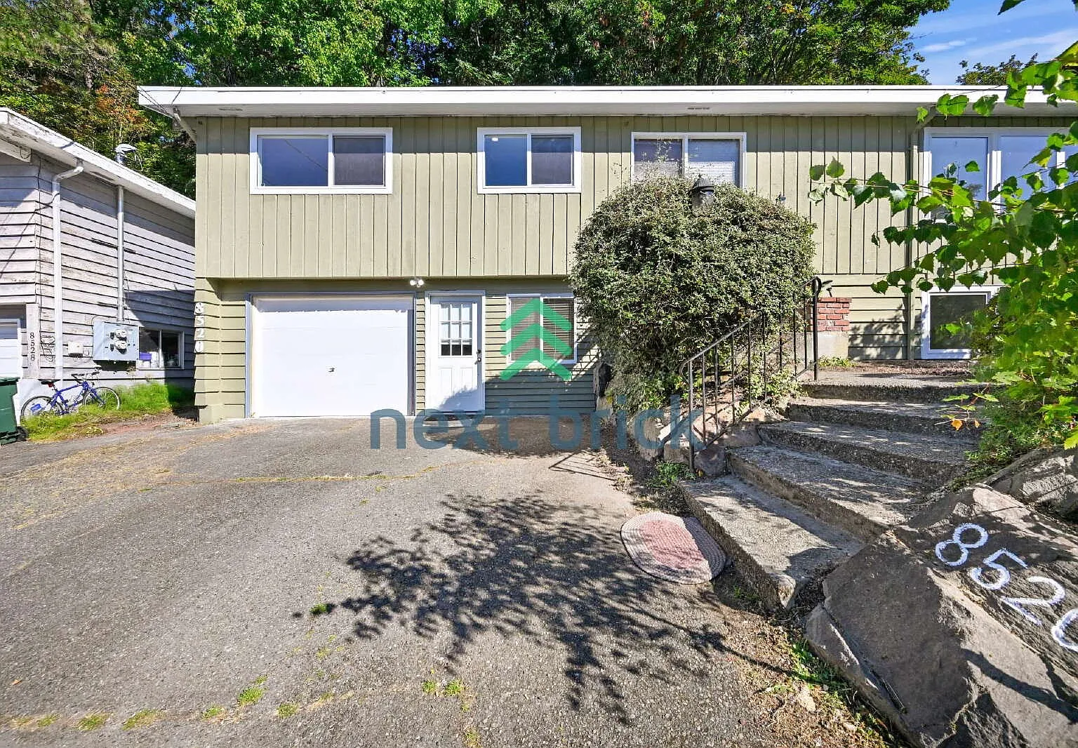 "Spacious 4-Bed Home with 4 Baths in Seattle's Prime Location 2600 Sq Ft of Comfort!" — Photo 1