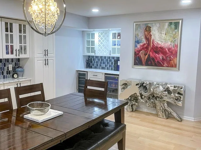Dining area extends to a dry bar with a wine cooler and a mini fridge!