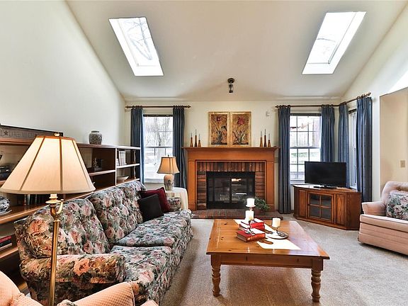 Wonderful open great room with high vaulted ceiling and two skylights for fantastic natural light - great space for casual relaxing and entertaining