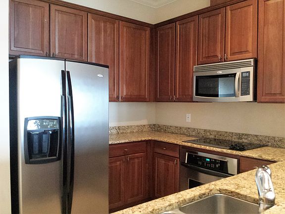 Granite kitchen w/ cherry cabinets