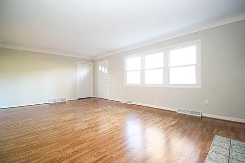 Sprawling 3BR/1.5BA Brick Ranch on a Huge Lot with Hardwoods, Finished Basement, CA, and 2.5 Car ... — Photo 3