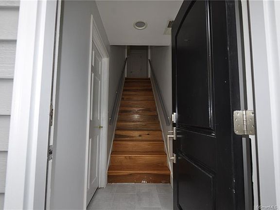 Stairs lead up to the apartment.