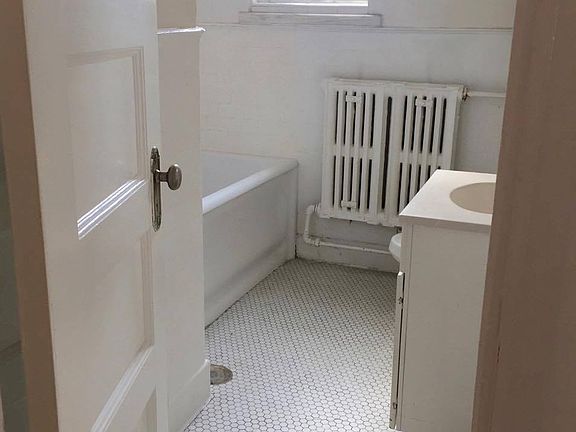 Bathroom with original features and character.