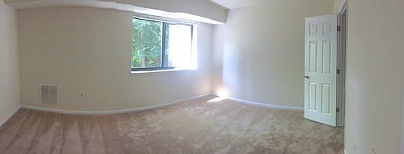 Bedroom with walk-in closet