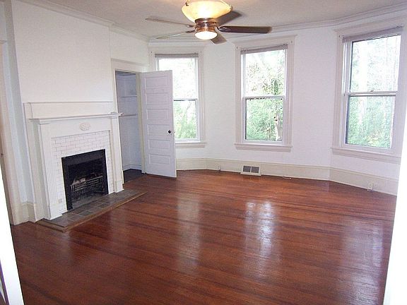 Downstairs bedroom with fireplace.