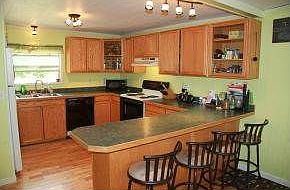 Large kitchen with bar