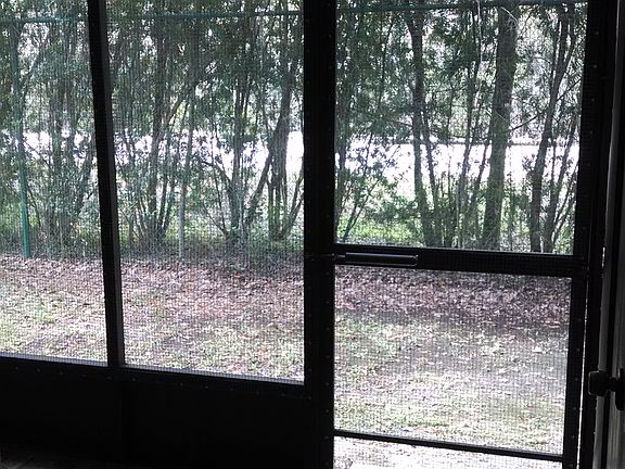 Fully screened scenic porch