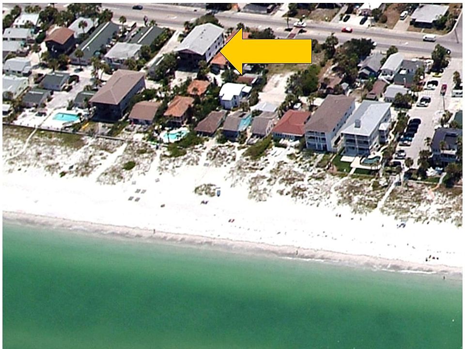 Just steps from the sparkling Gulf of Mexico