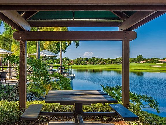 approximately 6 tables overlooking lake