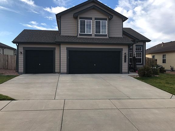 Front of House with 3 car garage!