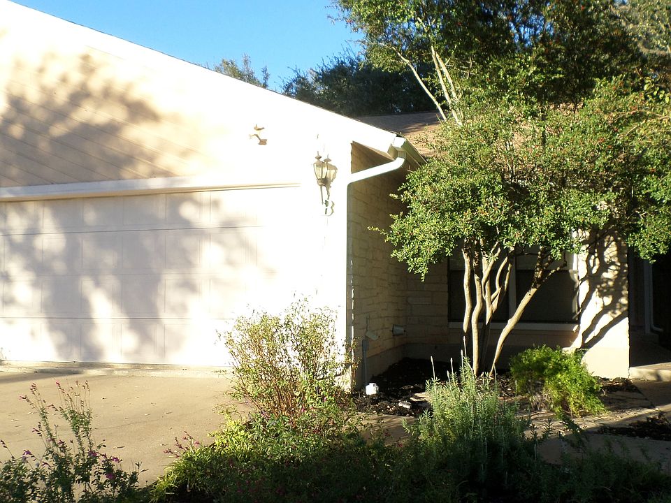 Two car garage with entry on right.