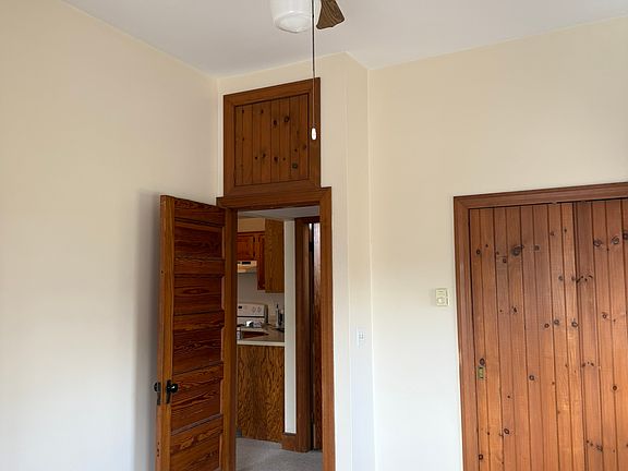 Bedroom with upper storage