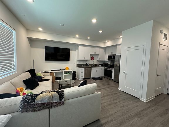 Open living area, kitchen, pantry, washer/dryer closet