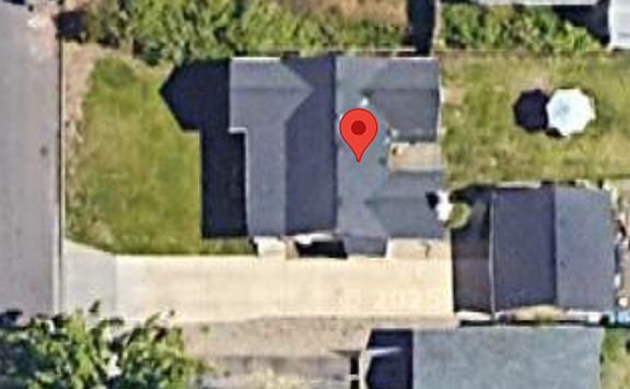 Aerial View, see large backyard, long driveway and garage
