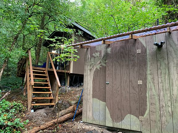 Sasquatch's Tiny Tree Home and the full bathroom are just steps away. (privacy atlas!)