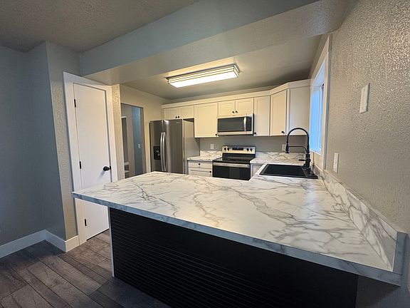 5th image of 6130 E 41st Ct APT 2