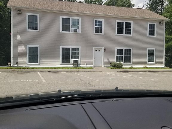 Exterior front of building. Apt 7 is top right.