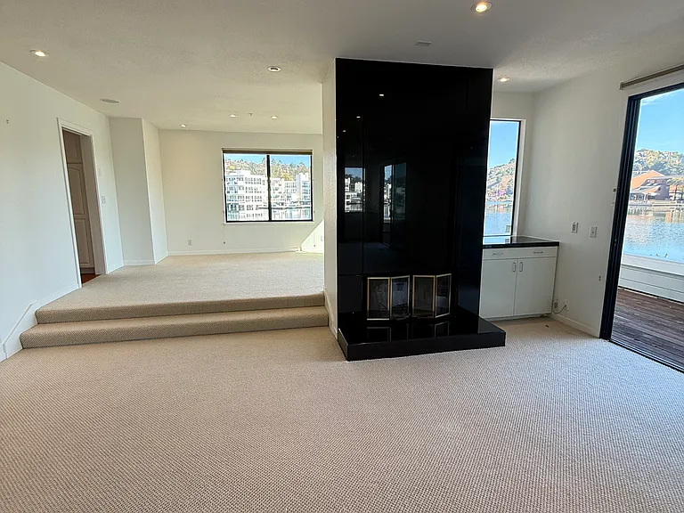 Living room opens to dining area.