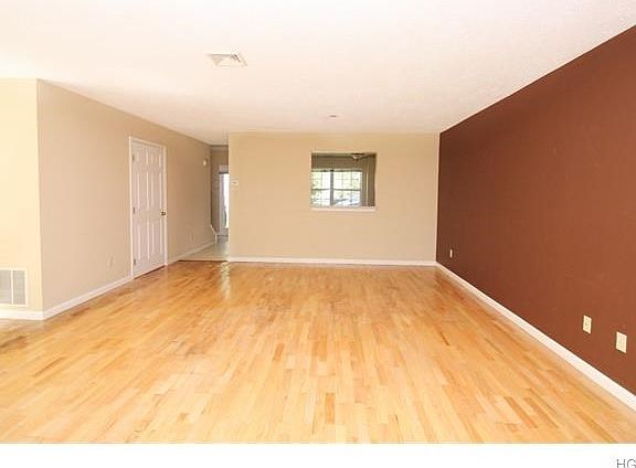 Large pass through window from the kitchen allows for easy access to the dining area