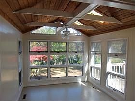 Breakfast room with vaulted ceilings
