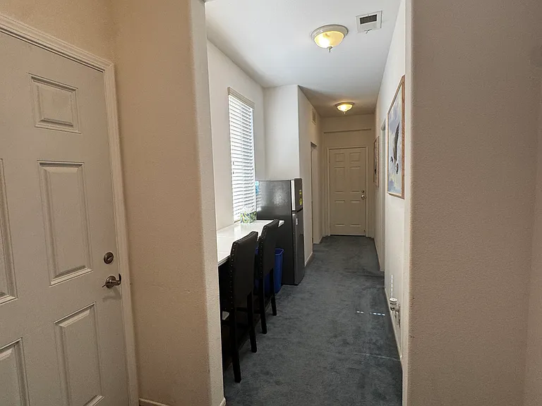 Private entry/exist door. North Wing Hallway- shared common area.