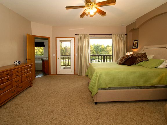 Master bed, bath and balcony