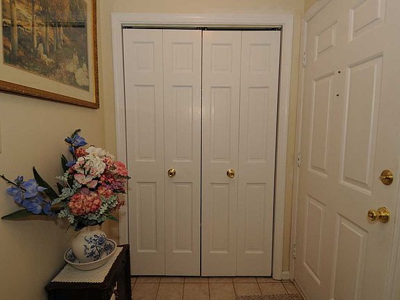 Welcoming Entry Foyer w/Double Coat Closet