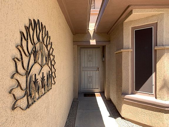 4th image of 16968 W Desert Rose Ln
