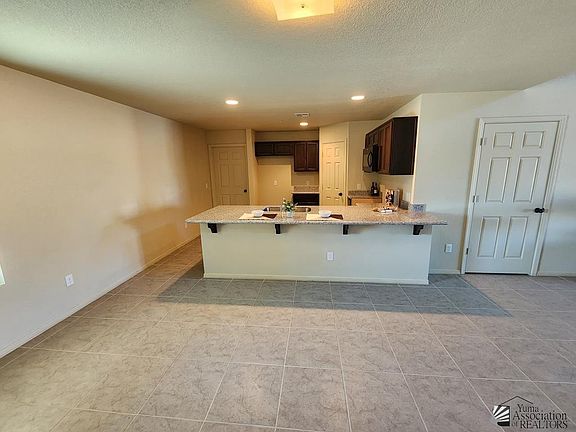 5th image of 7371 E 38th St