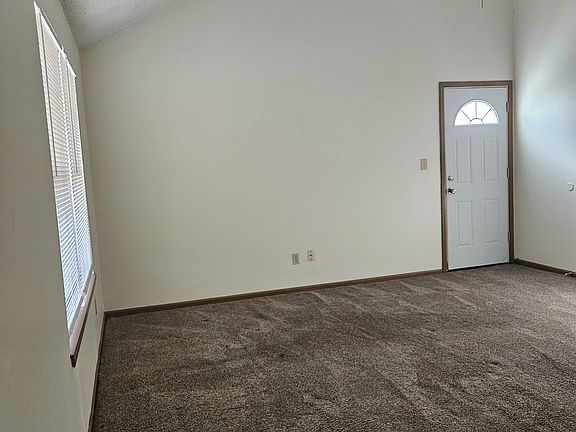 living room and side door to patio