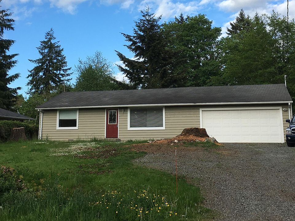 WELCOME HOME! Front View - Note: large stump recently removed, and driveway is in the process of receiving additoanl gravel.