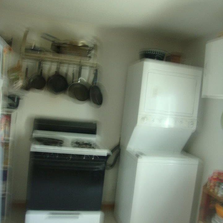 Stackable washer/dryer stays in the unit, along with the sto