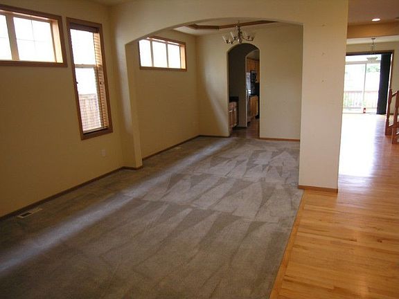 Looking from front door through living rm & dining room.