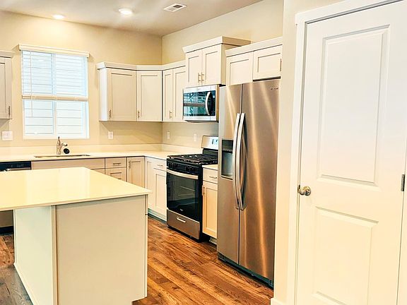 Kitchen View with Walkin Pantry Door
