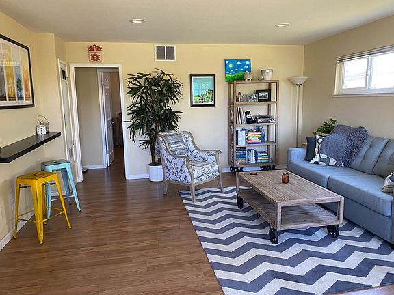 Living Room with recessed lighting and great natural light