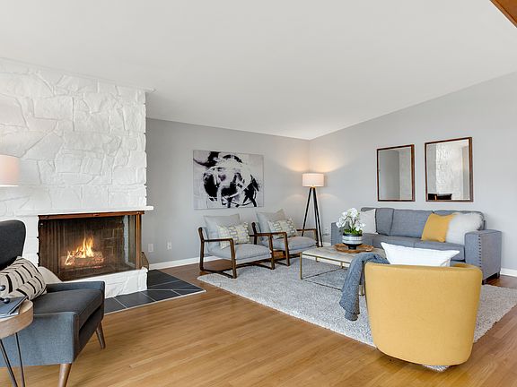 Hardwood floors and wood-burning fireplace