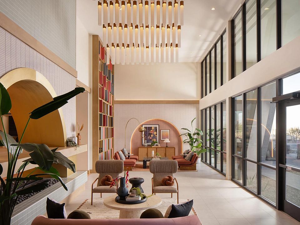 Soaring ceilings, curated desert details, and light-filled spaces set the tone at Modera Rio Salado.