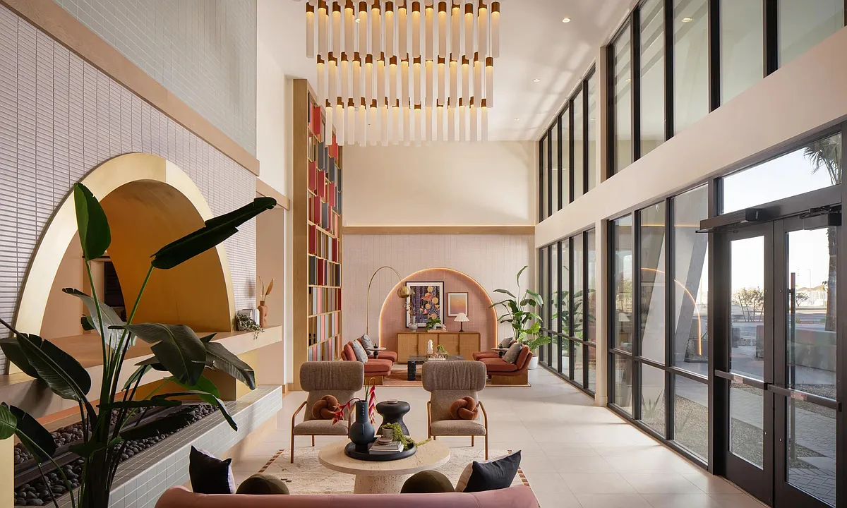 Soaring ceilings, curated desert details, and light-filled spaces set the tone at Modera Rio Salado. - Modera Rio Salado