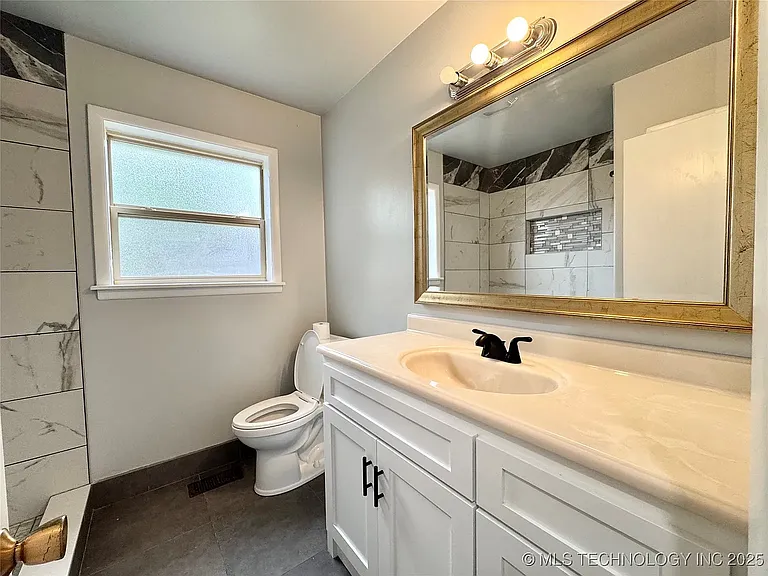 11311 E 15th Pl — Photo 39