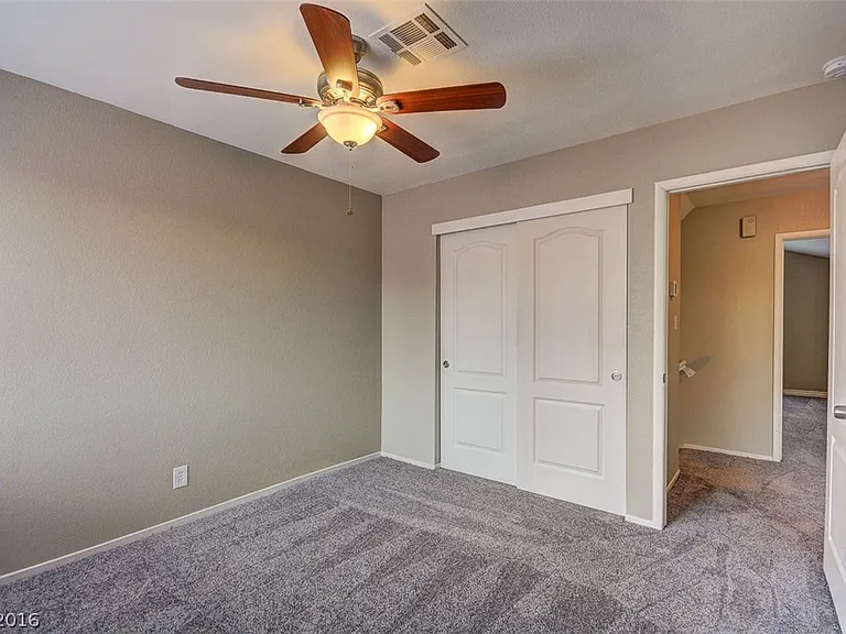 The flooring has been upgraded to laminate_there is no longer any carpet in this room