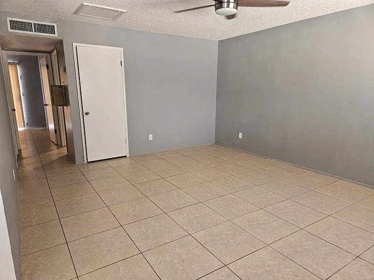 Large living room with new ceiling fan
recently painted