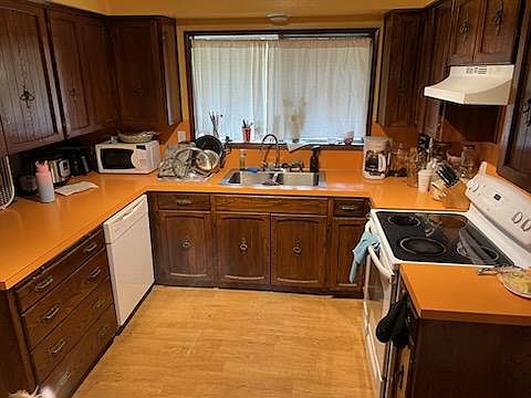 Main kitchen area also has breakfast area, pantry and dining room