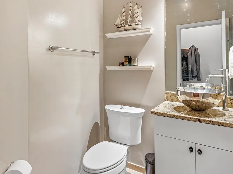 Main level half-bathroom.